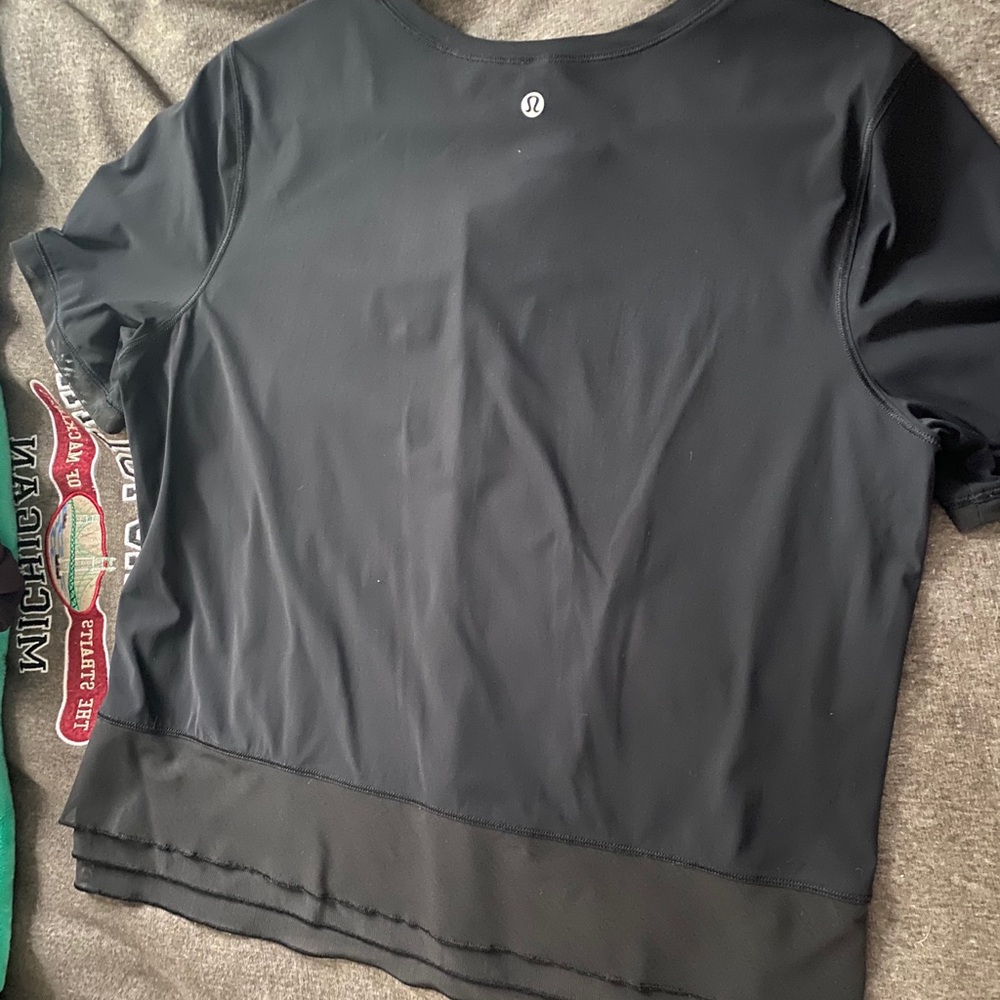 Lululemon black ruffle shirt